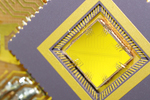 Ion trap chip, constructed by Professor Ron Folman and loaded with ions by Professor Ferdinand Schmidt-Kaler